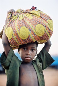 A young boy at the bus station in Sikasso, Mali