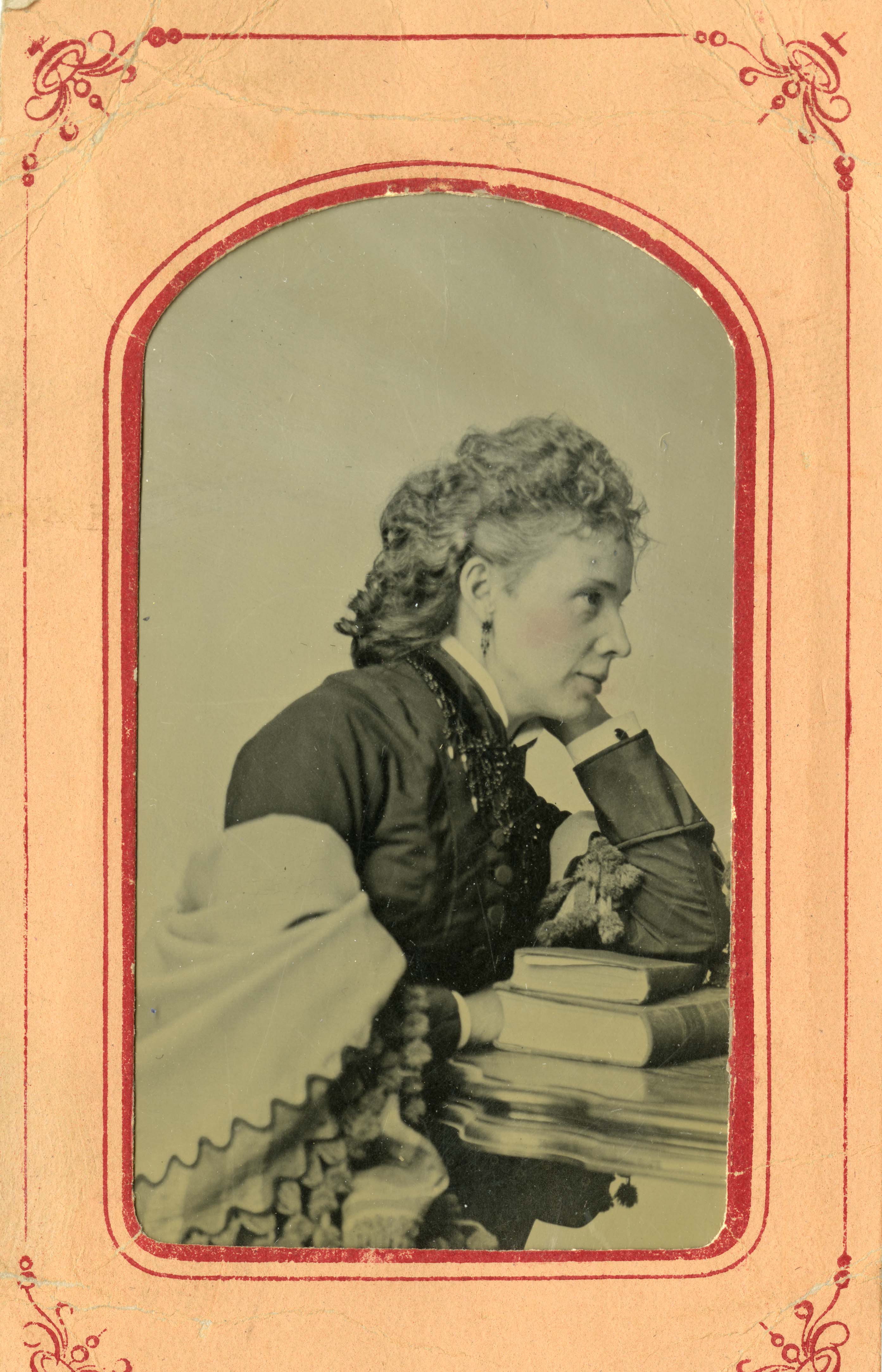 Tintype with orange paper mat from the 1860s (Human Development and Family Studies Photograph Collection)