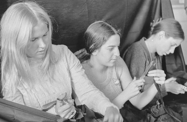 Members of the Student Senate cut armbands as part of a Vietnam War General Strike, taken October 7, 1969 by Howard Goldbaum