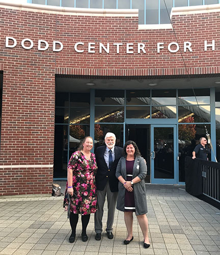 Betsy Pittman, University Archivist; Senator Christopher J. Dodd; and Rebecca Parmer, Head of Archives & Special Collections outside the newly renamed Dodd Center for Human Rights at the rededication on Friday, October 15, 2021.